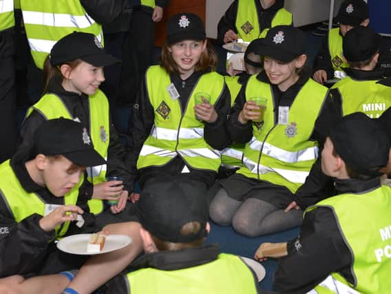 Children visit Nottinghamshire Police headquarters to celebrate the Mini Police 1st birthday