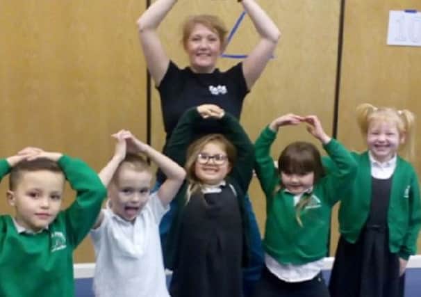 Rebecca Hart, from Dance Equation, with Oak Tree School pupils