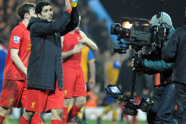 Liverpool celebrate a controversial win at Field Mill.