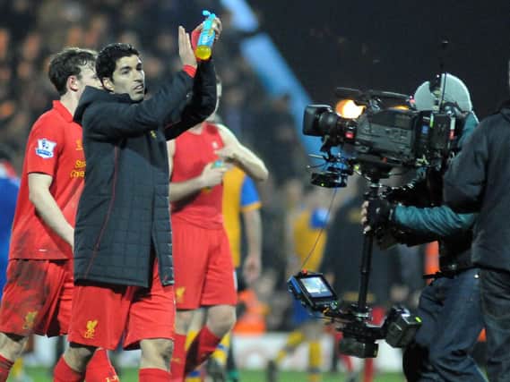 Liverpool celebrate a controversial win at Field Mill.