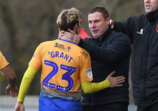 Picture Andrew Roe/AHPIX LTD, Football, EFL Sky Bet League Two, Mansfield Town v Macclesfield Town, One Call Stadium, 02/02/2019, K.O 3pm

Mansfield's Jorge Grant celebrates his opening goal with manager David Flitcroft

Andrew Roe>>>>>>>07826527594
