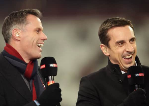 LONDON, ENGLAND - NOVEMBER 24:  Pundits Jamie Carragher (L) and Gary Neville laugh prior to the Premier League match between West Ham United and Leicester City at London Stadium on November 24, 2017 in London, England.  (Photo by Julian Finney/Getty Images)
