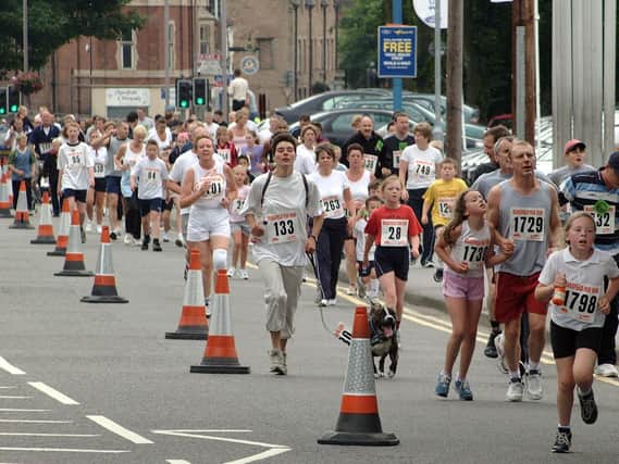 2003: Runners take to the streets of Mansfield for a fun run. Do you recognise anyone?