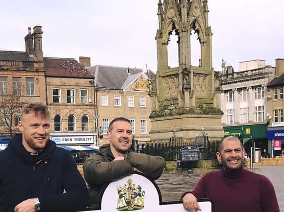 Top Gear hosts Freddie Flintoff, Paddy McGuinness and Chris Harris in Mansfield's Market Place.