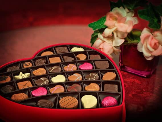 Traditional gifts include chocolates and flowers