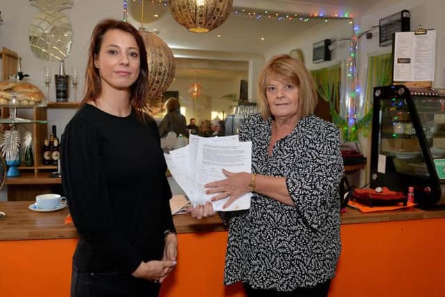 MP Gloria De Piero and Deanna with the petition.