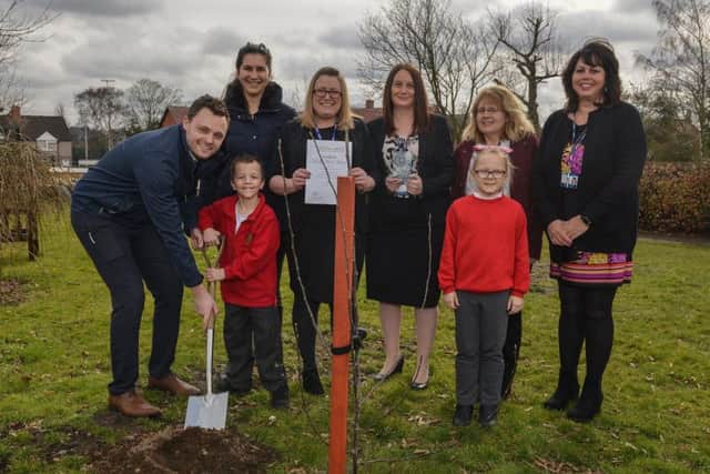 Forest Town Primary recieved a quality mark award from Nurture Group Network, pictured helping to plant a tree to mark the occasion is MP Ben Bradley with Nurture Group's Elisa Mascellani, assistant headteacher Laura Leedham, deputy headteacher, Nicola Lomas, Dinah Bishop and Jackie Whitaker