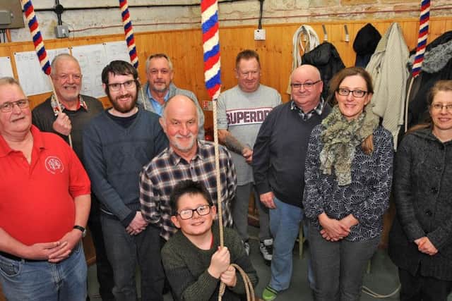 Byron Hemingray, aged nine, with his fellow bell ringers at St. Wilfrids Church in Kirkby who are looking for new recruits.