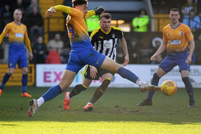 Mansfield Town's Tyler Walker tries to connect with the ball.