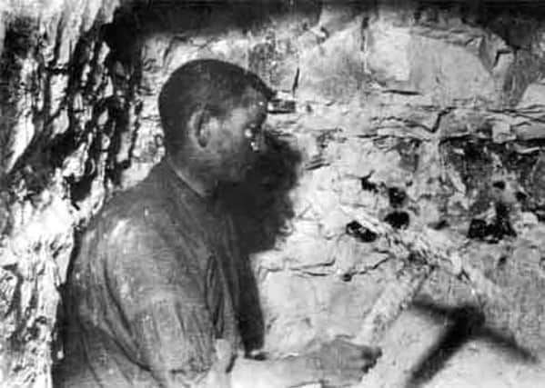 One of the tunnellers at work, under enemy lines, during the First World War.