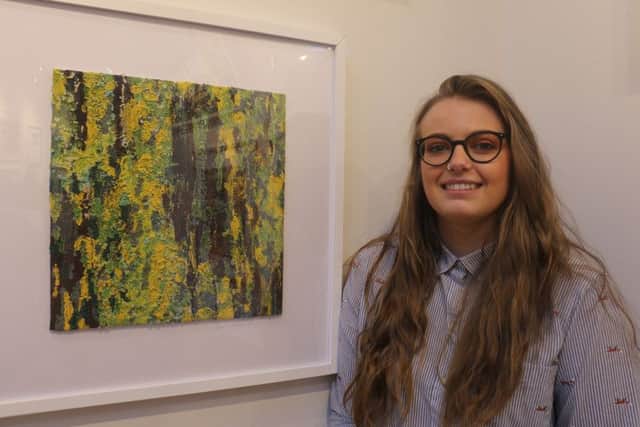 Art student Ellie-Rose Duffin with her piece Lichen which is part of the Open Exhibition at the Harley Gallery