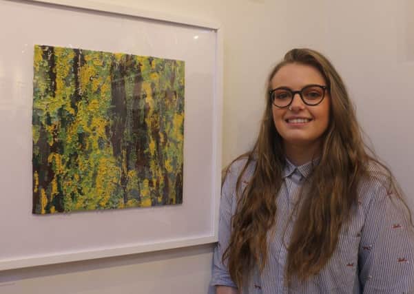Art student Ellie-Rose Duffin with her piece Lichen which is part of the Open Exhibition at the Harley Gallery
