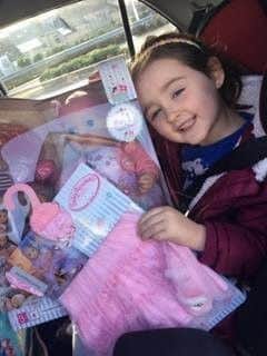 Amelia Cook, 4, with her new Annabelle toy.