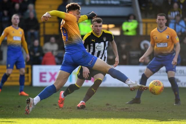 Tyler Walker stretches for the ball at Meadow Lane.
