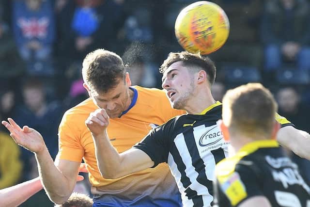 Picture by Howard Roe/AHPIX.com;Football;Skybet;
Notts County v Mansfield Town
16/2/2019 KO 1.00pm; Meadow Lane;
copyright picture;Howard Roe;07973 739229
Stag's Ben Turner heads at Countys goal