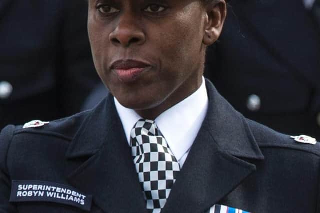 Superintendent Robyn Williams leads new recruits to the Metropolitan Police Service during their 'Passing Out Parade' in 2015. Photo - Rob Stothard/Getty Images