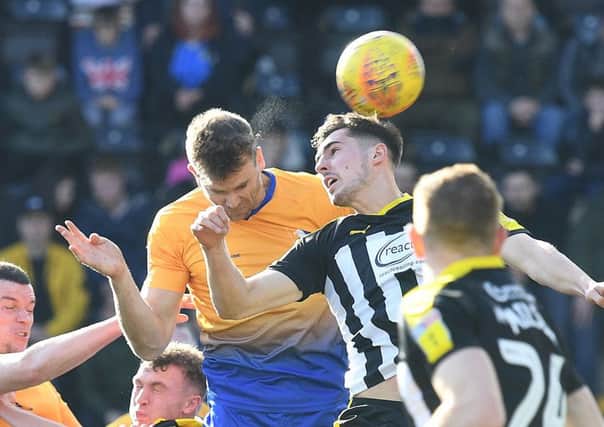 Picture by Howard Roe/AHPIX.com;Football;Skybet; 
Notts County v Mansfield Town
16/2/2019  KO 1.00pm; Meadow Lane;
copyright picture;Howard Roe;07973 739229

Stag's Ben Turner heads at Countys goal