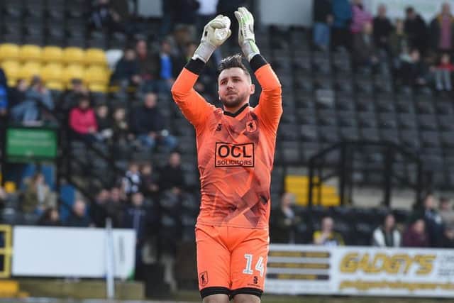Jordan Smith applauds the Stags fans before the defeat at Notts County