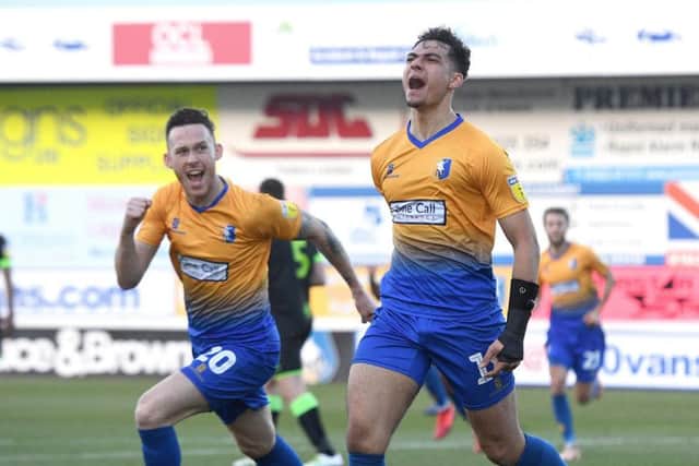 Tyler Walker celebrates his goal.