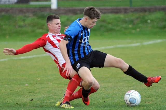 Rhys Dolan (right), who scored Selstons goal in the 1-1 draw.