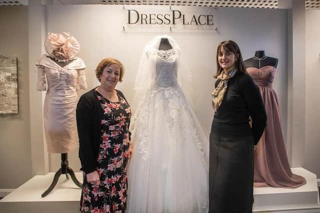 Helen Dickson, left, at the opening of her new Dressplace store in Sherwood. Photo by Steve Smailes Photography (6920358).