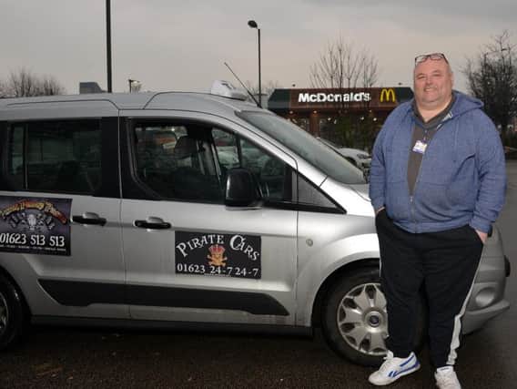 Taxi driver Mark Holmshaw is contesting a parking fine.