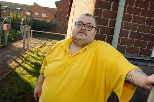 Michael Nash who is disabled and partially sighted and is asking for a CCTV camera to be installed by the council in the alley by his house to stop the anti-social behaviour that is blighting the Oak Tree estate.