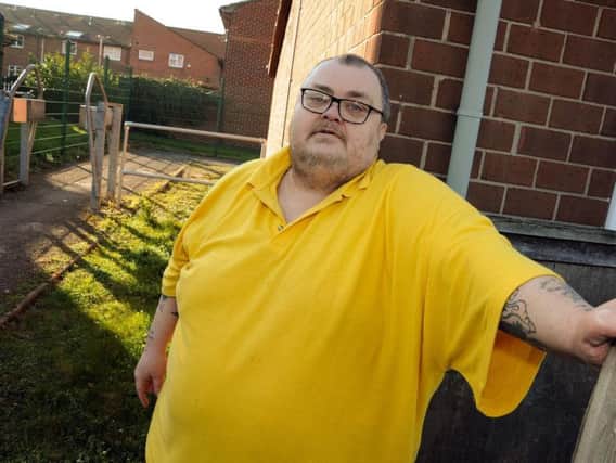 Michael Nash who is disabled and partially sighted and is asking for a CCTV camera to be installed by the council in the alley by his house to stop the anti-social behaviour that is blighting the Oak Tree estate.