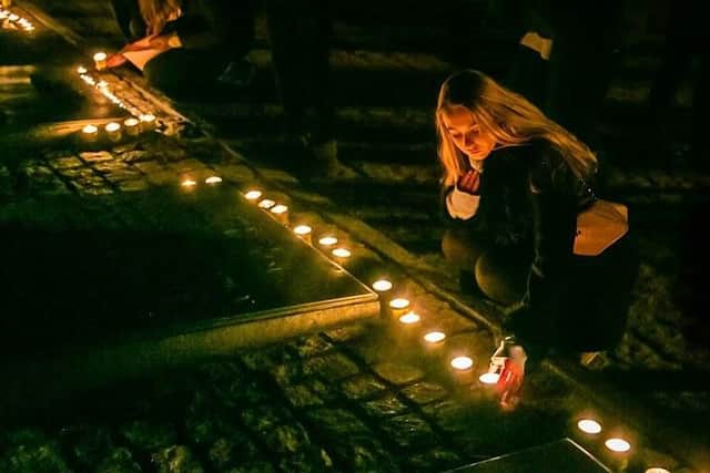 Students light candles. Taken by Yakir Zur