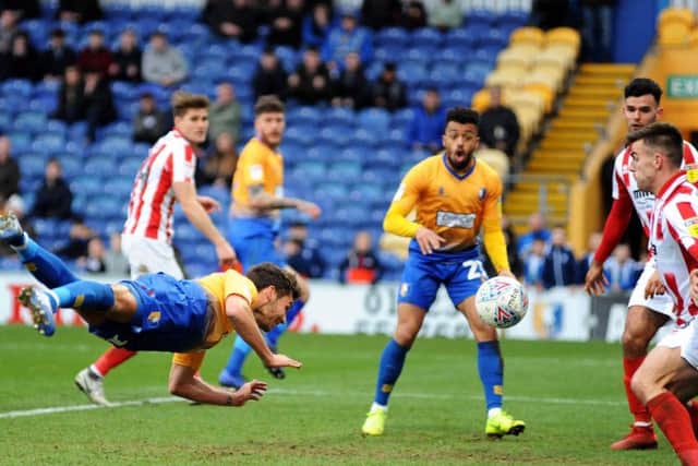Mansfield Town v Cheltenham.        Will Atkinson scores with a diving header to put the Stags back in front.
