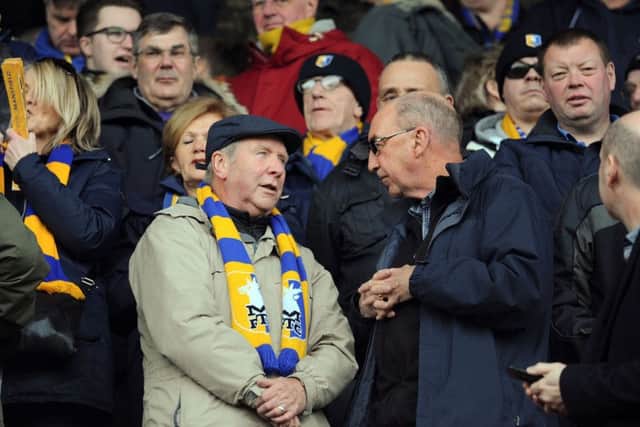 Mansfield Town fans ahead of kick-off against Cheltenham Town.