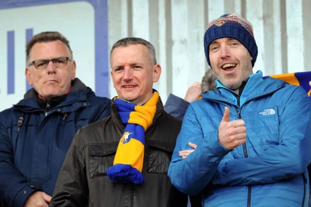 Mansfield Town fans ahead of kick-off against Cheltenham Town.