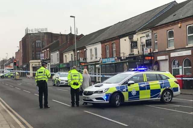 Police at the scene of the stabbing.