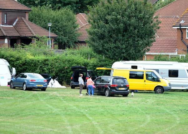 Travellers on Sutton Lawn adjacent to properties on Bramley Court.