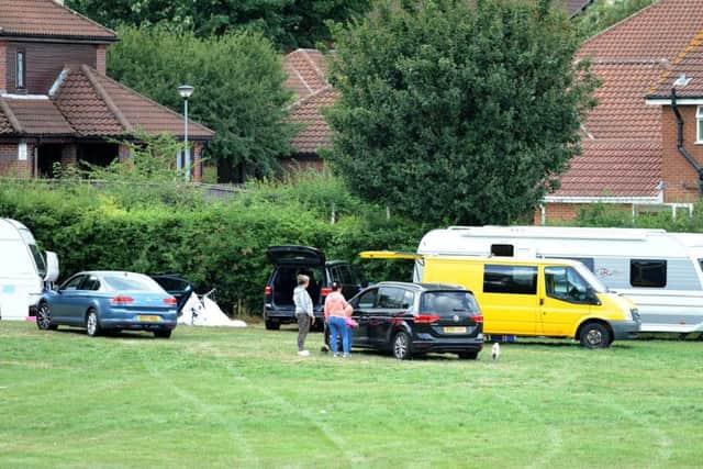 Travellers on Sutton Lawn adjacent to properties on Bramley Court.