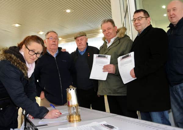 Supporters of the Mineworkers Pension Fairplay petition gather signatures outside the Four Seasons shopping centre. Pictured are from left, Amanda Fisher, Barry Wright, Harvey Hunt, Charles Chiverton, Mick Newton and Steve Betts.