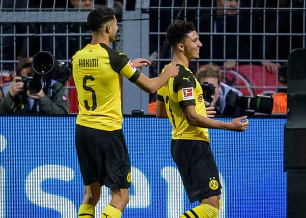 Jadon Sancho could become the first £100m English player. (Photo by Jörg Schüler/Getty Images)