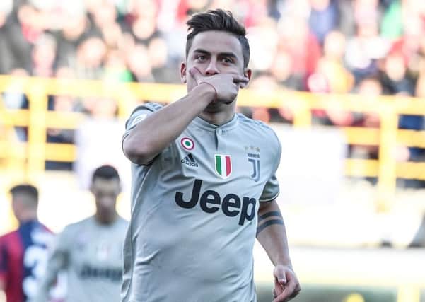 Juventus' Argentine forward Paulo Dybala is wanted by Manchester United. (Photo credit TIZIANA FABI/AFP/Getty Images)