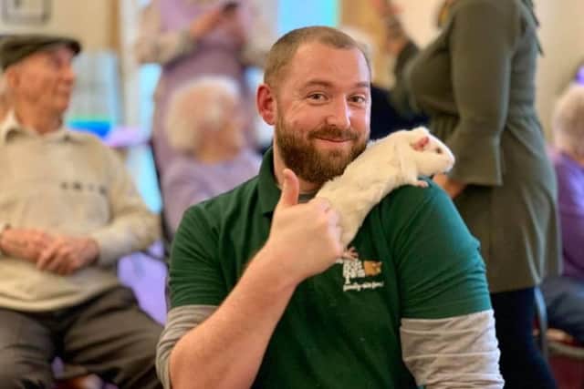Daniel with an Guinea pig.