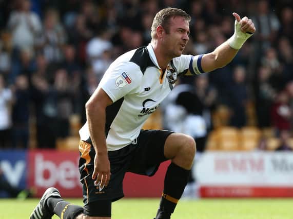 Tom Pope is looking to score his 100th Port Vale goal.