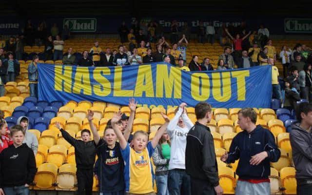 MANSFIELD, UNITED KINGDOM - APRIL 26: Mansfield Town fans demonstrate their disapproval of owner Keith Haslam after the Coca Cola Division 2 match between Mansfield Town and Rotherham United at Field Mill Ground on April 26, 2008 in Mansfield, England  (Photo by Gary M. Prior/Getty Images)