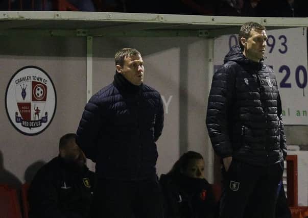 Picture by Gareth Williams/AHPIX.com; Football; Sky Bet League Two; Crawley Town v Mansfield Town; 12/3/2019  KO 19.45; The People's Pension Stadium; copyright picture; Howard Roe/AHPIX.com; Mansfield boss David Flitcroft and his assistant Ben Futcher watch on during the early stages at Crawley