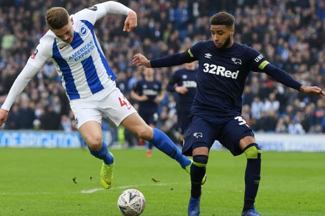 BRIGHTON, ENGLAND - FEBRUARY 16:  Viktor Gyokeres of Brighton and Hove Albion is challenged by Jayden Bogle of Derby County during the FA Cup Fifth Round match between Brighton and Hove Albion and Derby County at Amex Stadium on February 16, 2019 in Brighton, United Kingdom.  (Photo by Mike Hewitt/Getty Images)