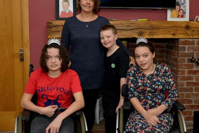 Louise is pictured with son Nathan, eight, Jasmine and Bethany.