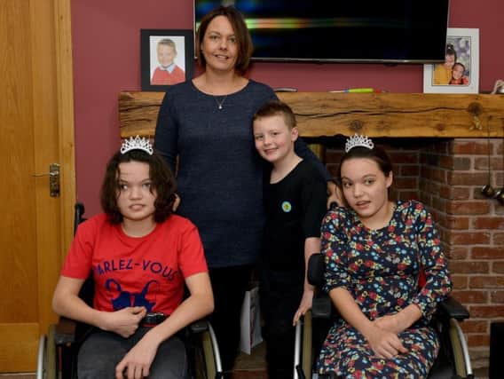 Louise is pictured with son Nathan, eight, Jasmine and Bethany.