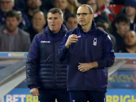 Forest manager Martin O'Neill, right, and his assistant Roy Keane,