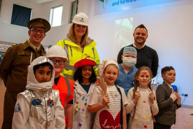 Mansfield MP Ben Bradley with staff and pupils from Flying High Academy, who dressed up for careers day