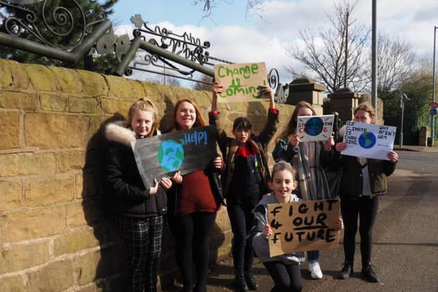 The children pictured on Bath Lane, Mansfield, on their way to the town centre.