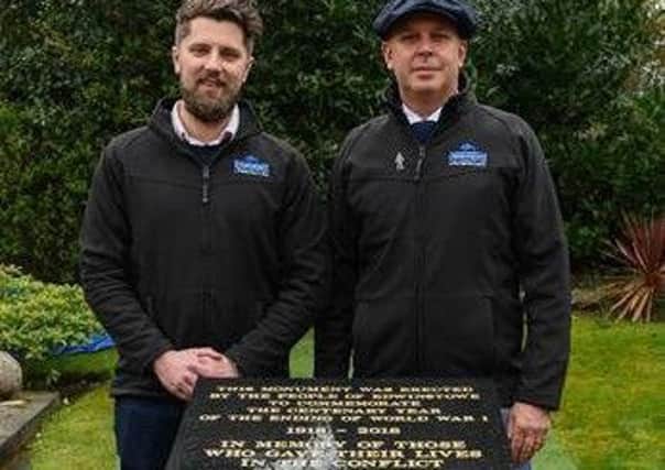 Forterra duo Nigel Jackson and Matt Mendham by the new war memorial.