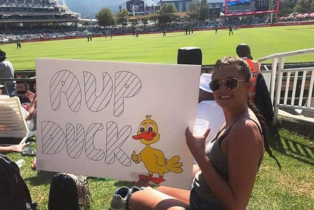 Kathryn Hardy of Sutton with her Ay up me duck banner at the South Africa v Sri Lanka cricket match at Cape Town South Africa.